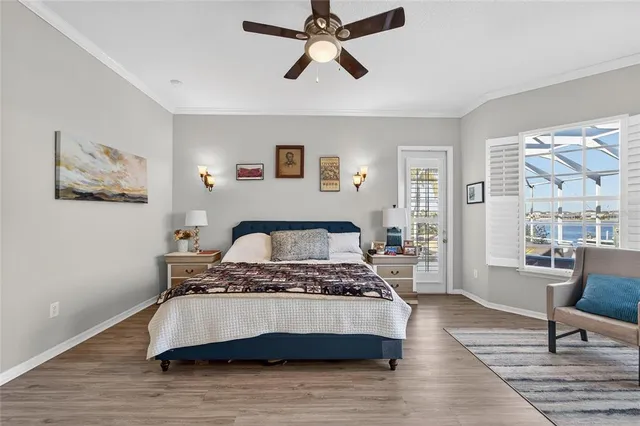 a bedroom with bed and a window