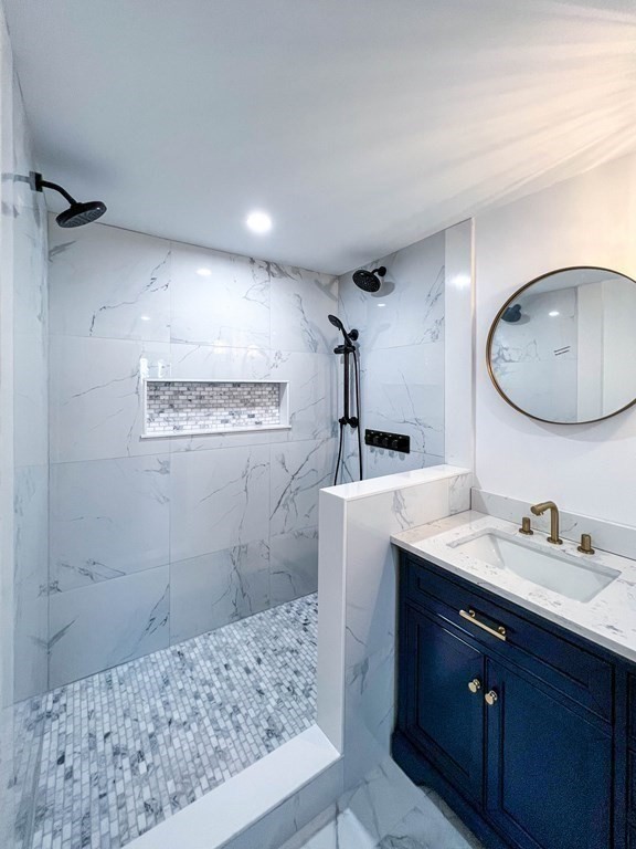 43 Oregon Road Ashland, MA 01721 - Photo 18 of 42 a bathroom with a sink a toilet and shower