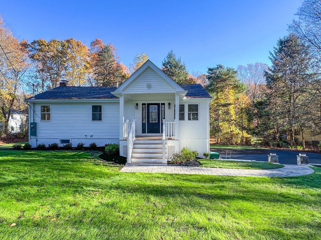 43 Oregon Road Ashland, MA 01721 - Photo 2 of 42 a front view of a house with garden