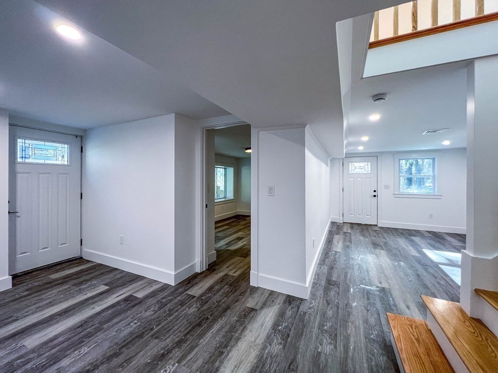 43 Oregon Road Ashland, MA 01721 - Photo 21 of 42 wooden floor in an empty room with a window