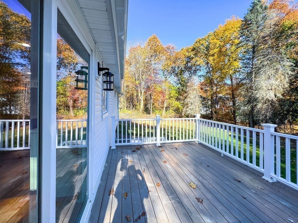 43 Oregon Road Ashland, MA 01721 - Photo 36 of 42 a view of a balcony with wooden floor