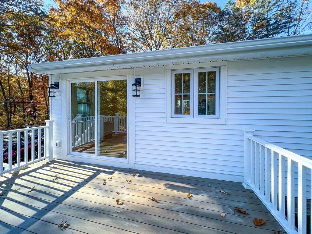 43 Oregon Road Ashland, MA 01721 - Photo 37 of 42 a view of a house with a wooden floor