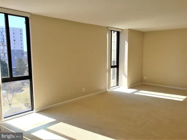 a view of an empty room with window