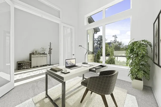 a dining room with a table and chairs