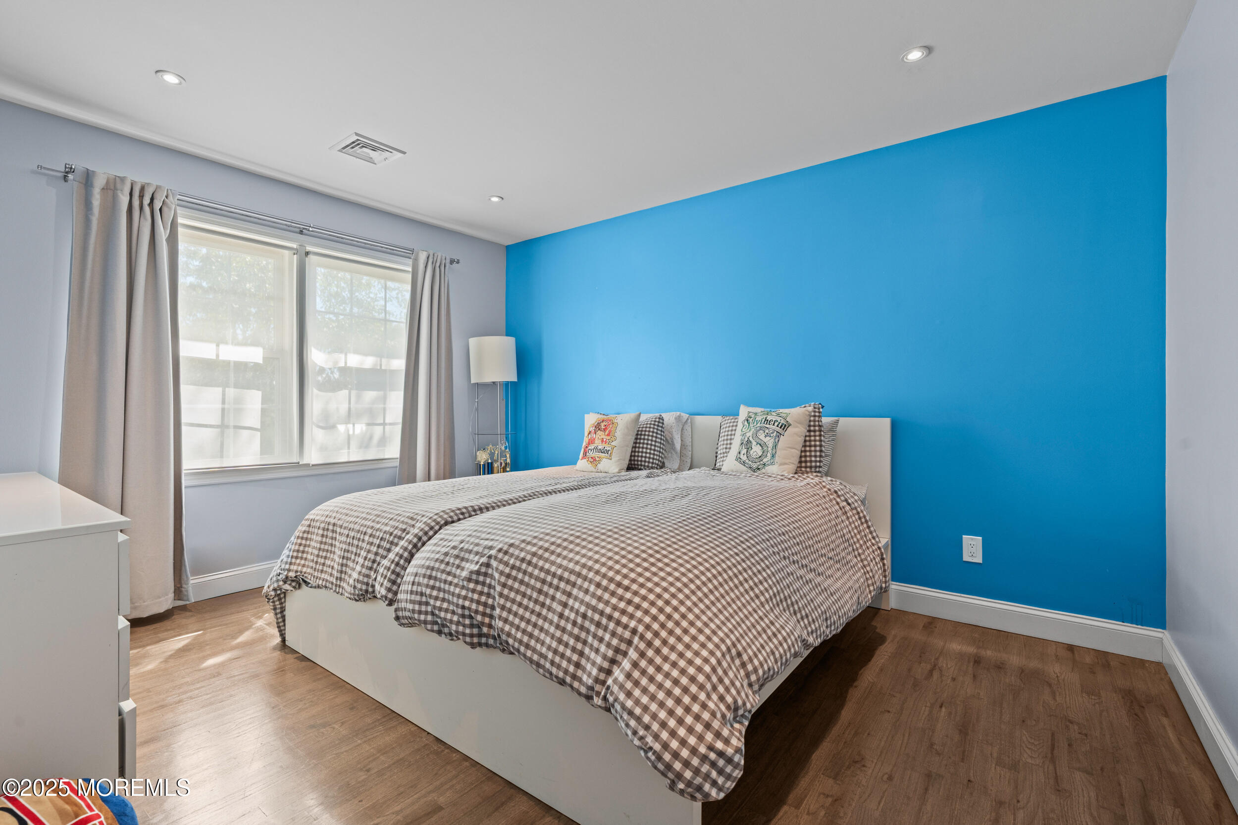 80 Cooper Avenue West Long Branch, NJ 07764 - Photo 19 of 32 a bedroom with a bed and window