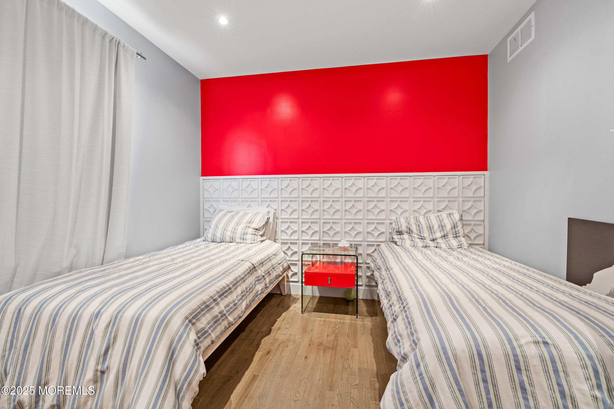 80 Cooper Avenue West Long Branch, NJ 07764 - Photo 21 of 32 a bedroom with a bed and a mirror