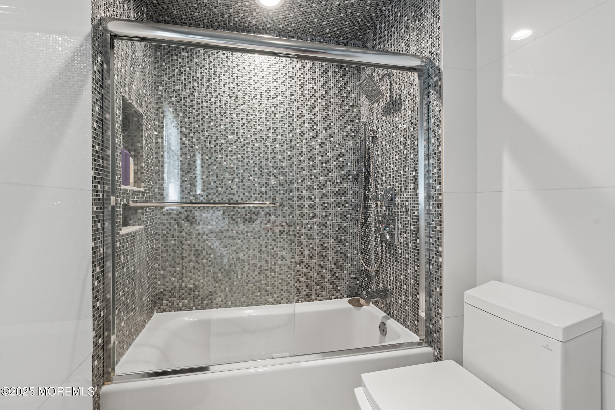 80 Cooper Avenue West Long Branch, NJ 07764 - Photo 23 of 32 a bathroom with a bathtub and a shower