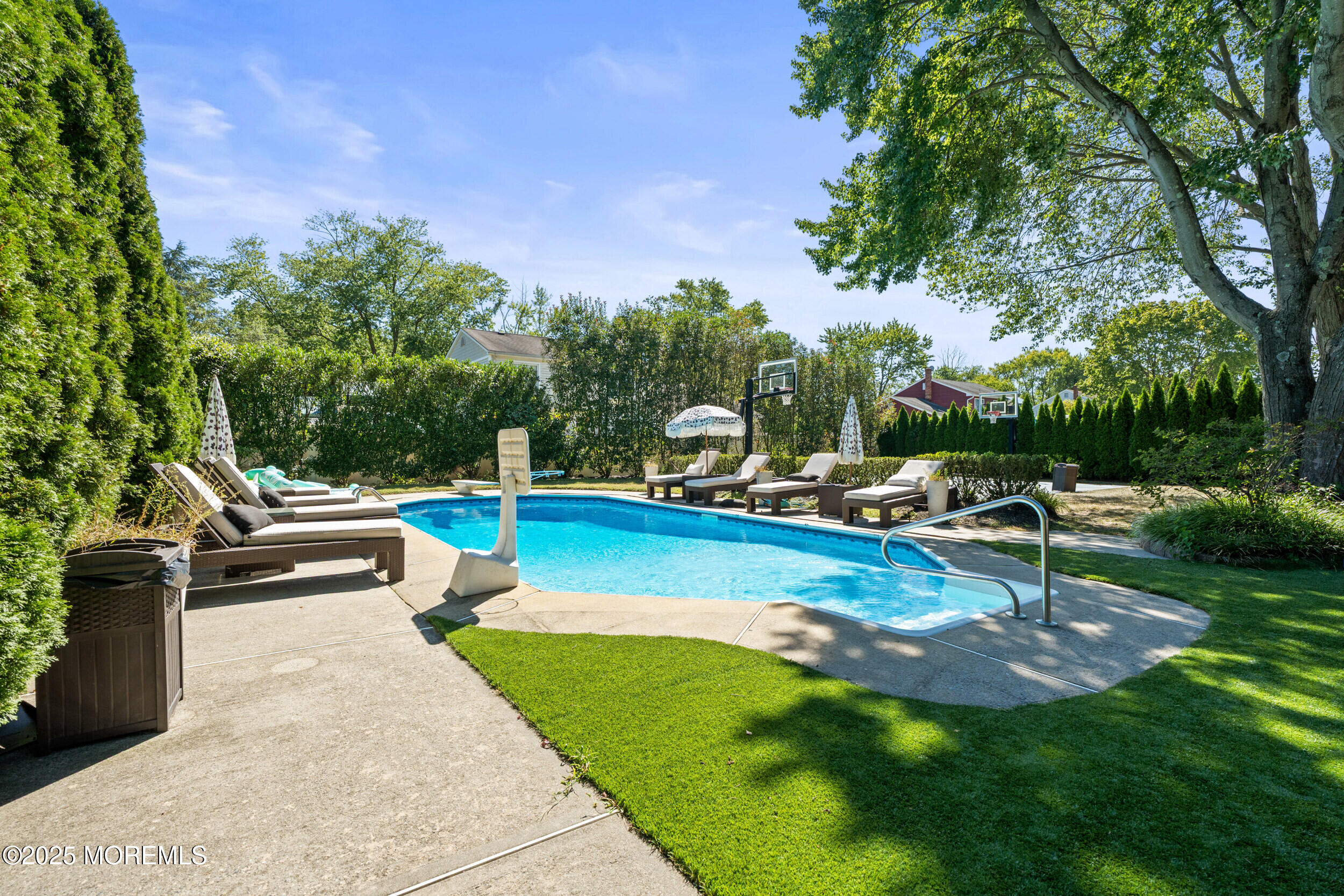 80 Cooper Avenue West Long Branch, NJ 07764 - Photo 27 of 32 a view of a swimming pool with a patio