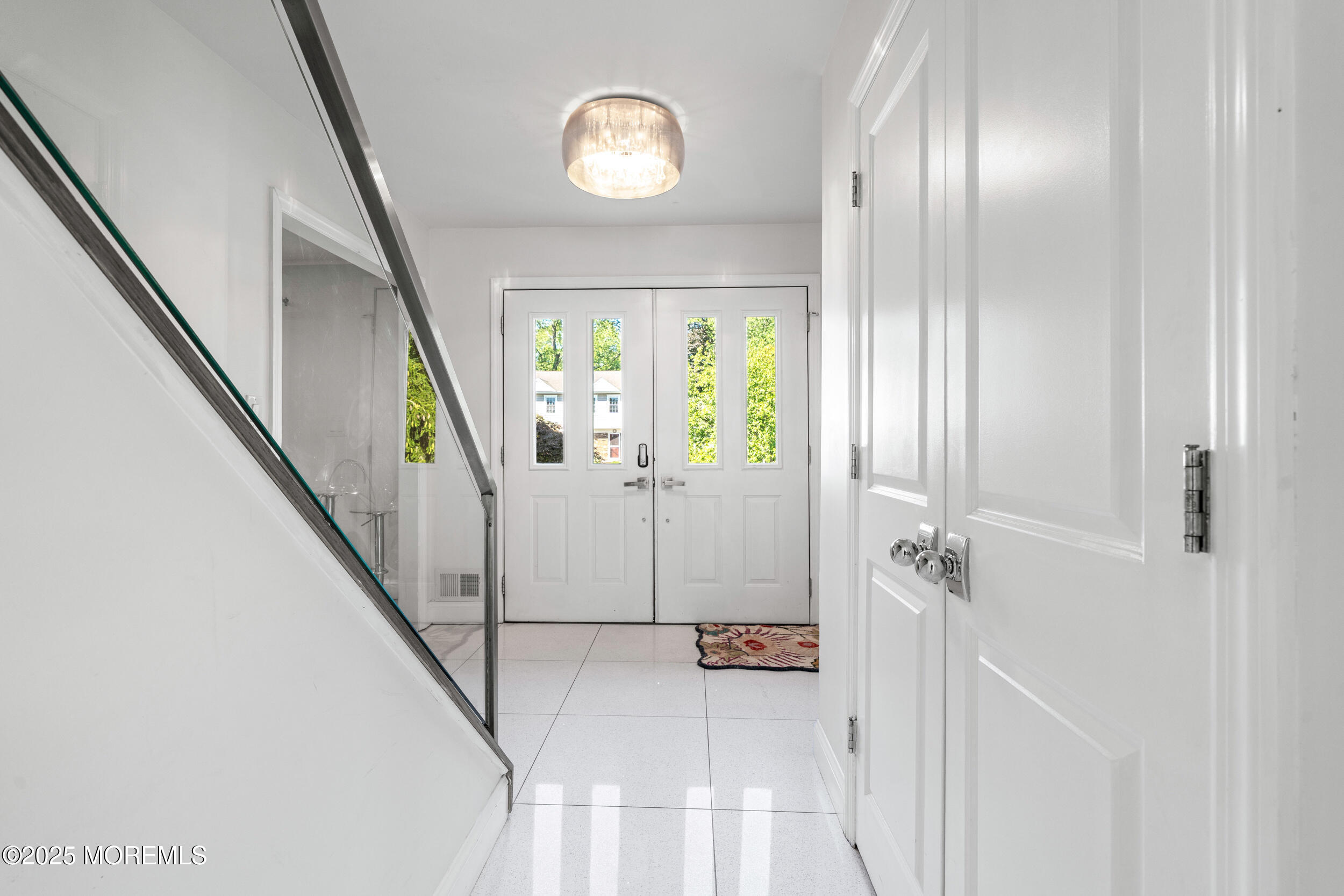 80 Cooper Avenue West Long Branch, NJ 07764 - Photo 3 of 32 a view of an entryway with wooden floor