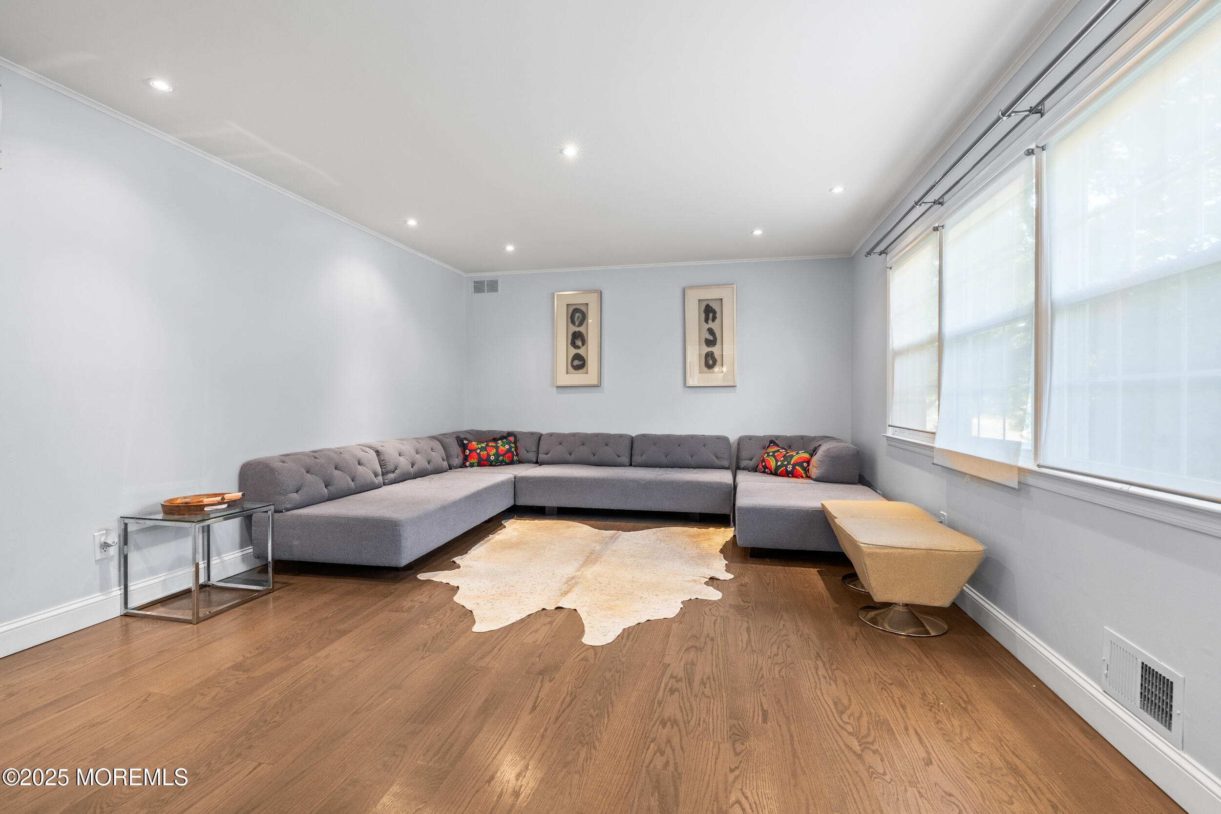 80 Cooper Avenue West Long Branch, NJ 07764 - Photo 5 of 32 a living room with furniture and a large window