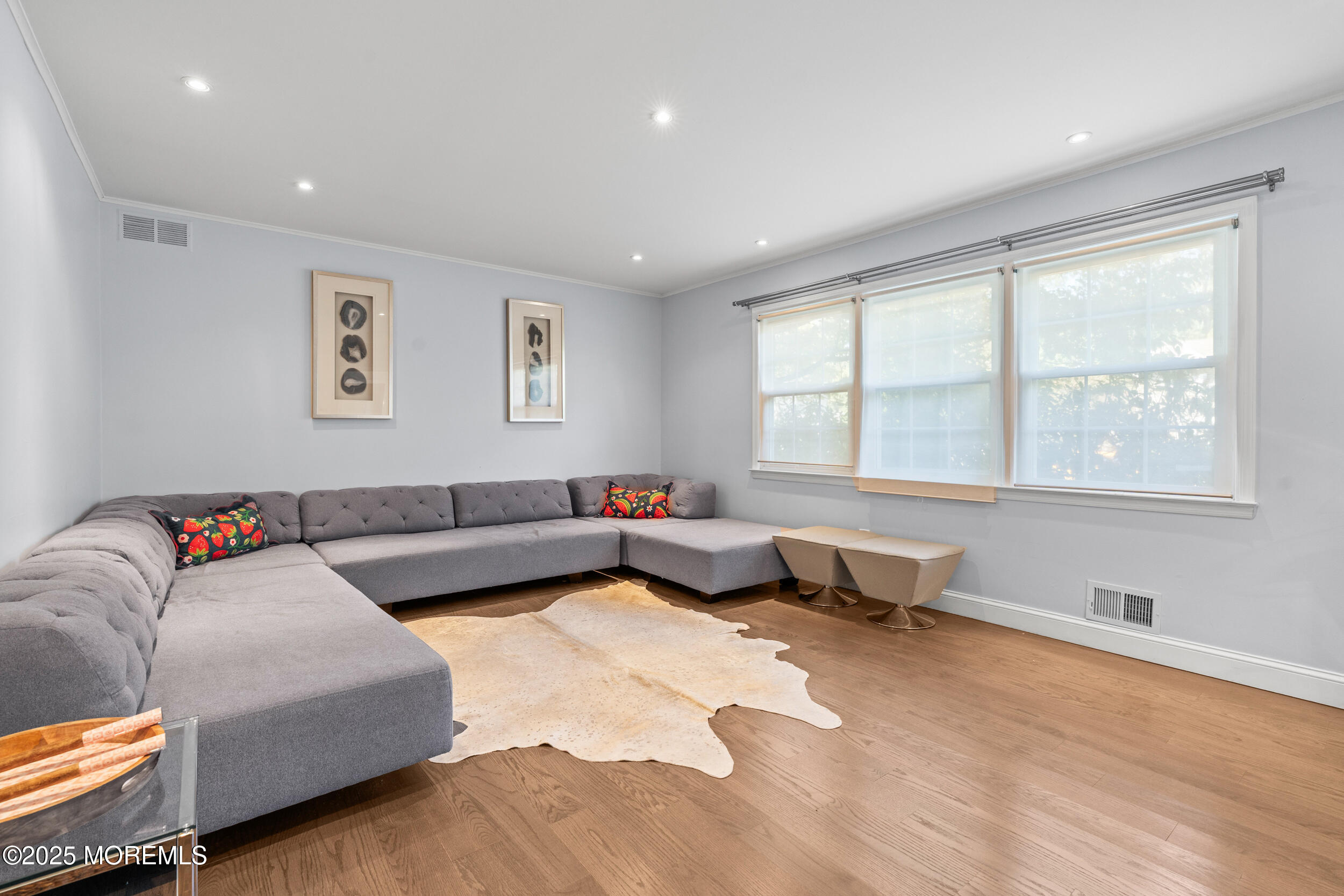 80 Cooper Avenue West Long Branch, NJ 07764 - Photo 6 of 32 a living room with furniture and a window