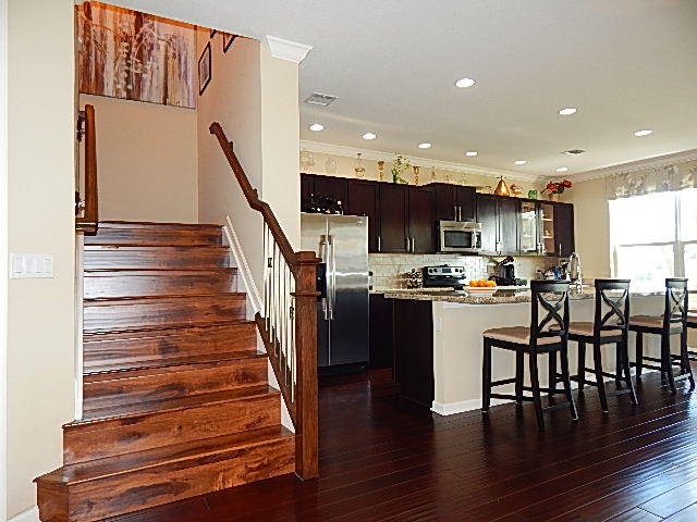 1472 Northwest 48th Lane Boca Raton, FL 33431 - Photo 13 of 47 1472 kitchen n stairs from front door
