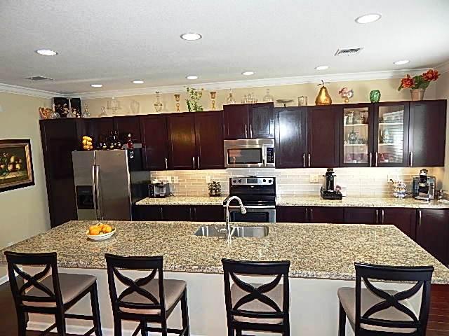 1472 Northwest 48th Lane Boca Raton, FL 33431 - Photo 8 of 47 1472 kitchen from living room BEST