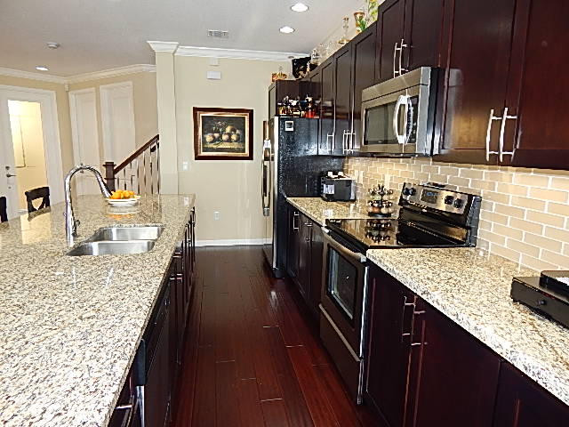 1472 Northwest 48th Lane Boca Raton, FL 33431 - Photo 10 of 47 1472 kitchen from sgdoor