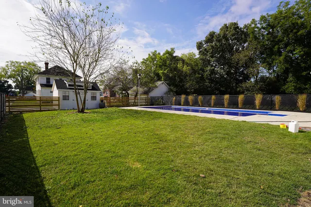 a view of a house with a big yard