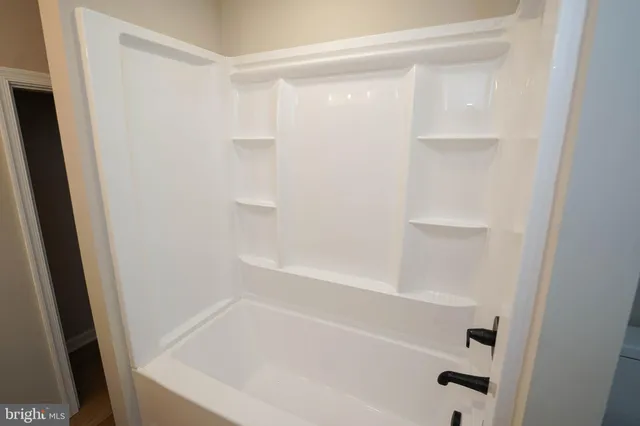 a close view of a bathtub in bathroom