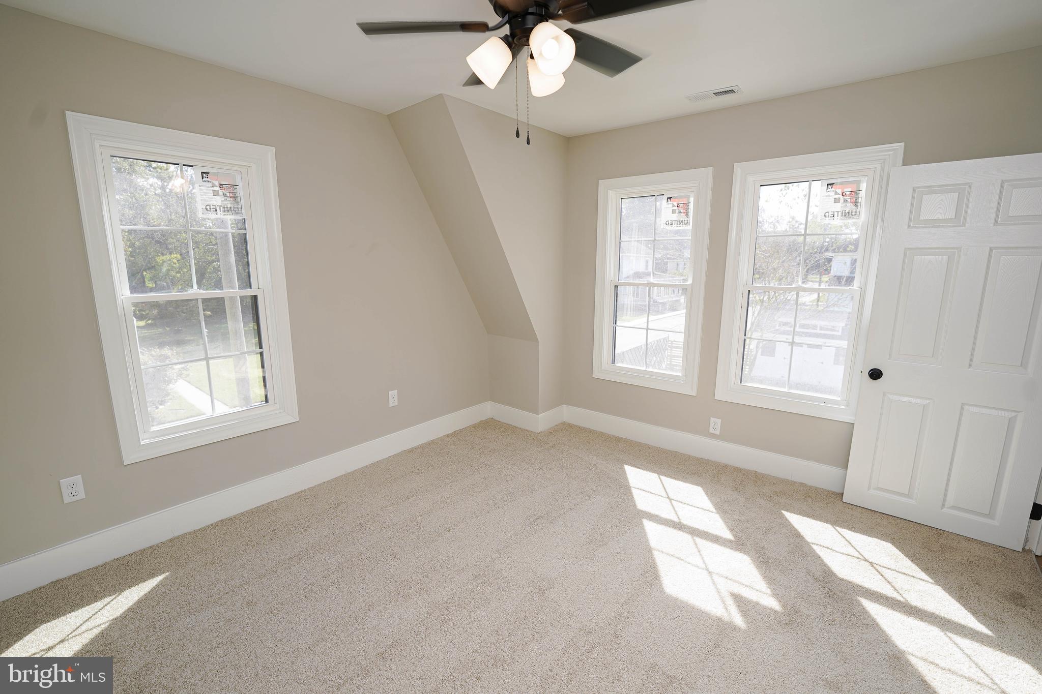 406 Delaware Avenue Delmar, DE 19940 - Photo 38 of 48 a view of an empty room with a window
