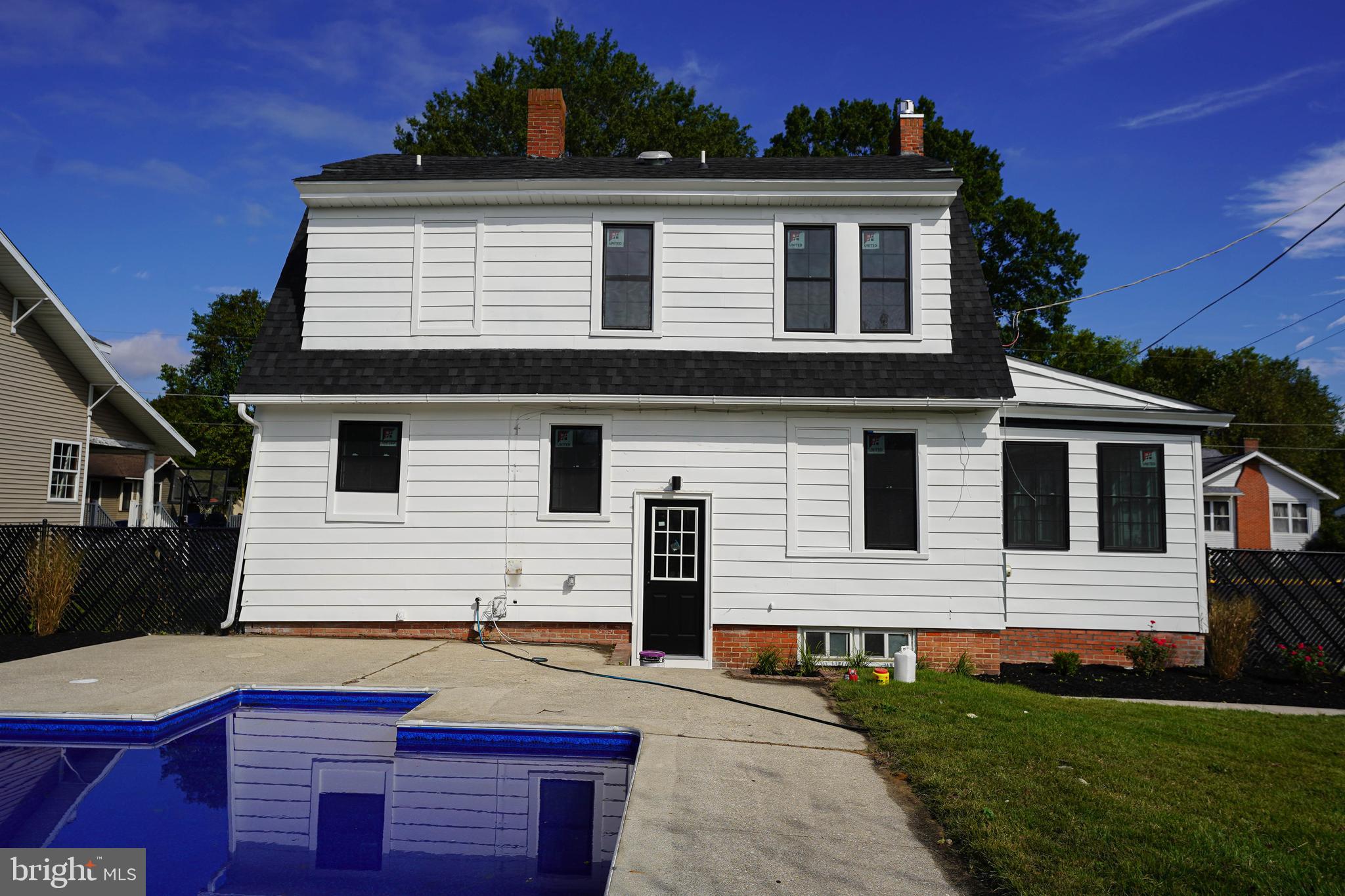 406 Delaware Avenue Delmar, DE 19940 - Photo 46 of 48 a front view of a house with a yard
