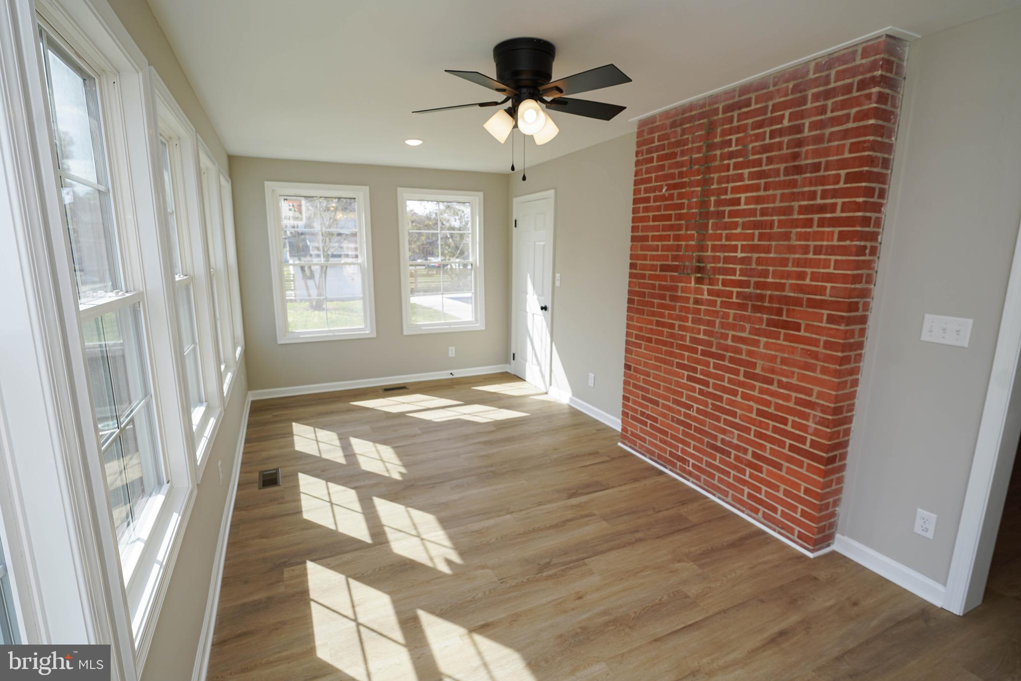 406 Delaware Avenue Delmar, DE 19940 - Photo 9 of 48 a view of an empty room and window