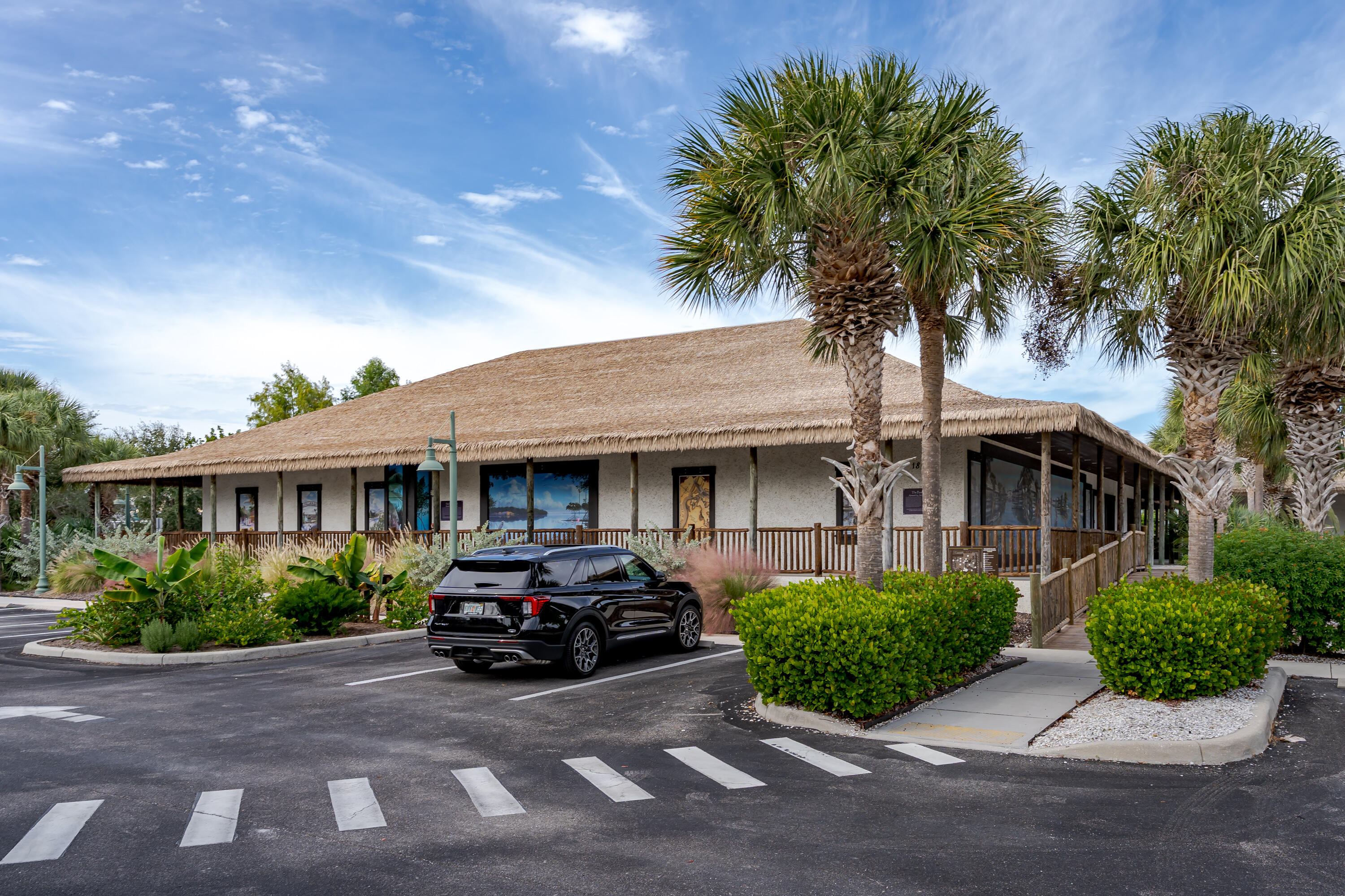 1414 Delbrook Way Marco Island, FL 34145 - Photo 12 of 21 a view of a car park in front of house