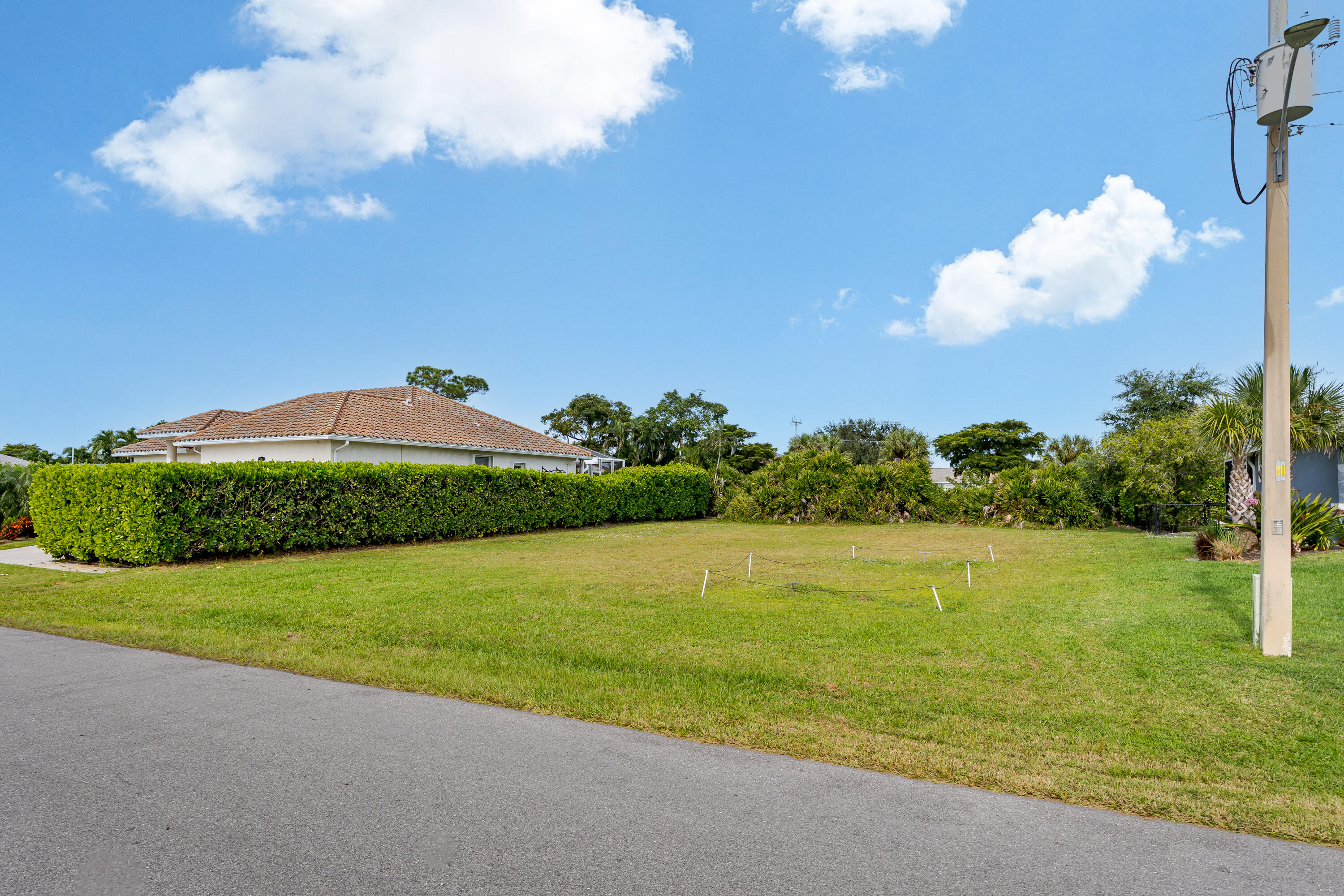1414 Delbrook Way Marco Island, FL 34145 - Photo 2 of 21 a view of a golf course with a lake
