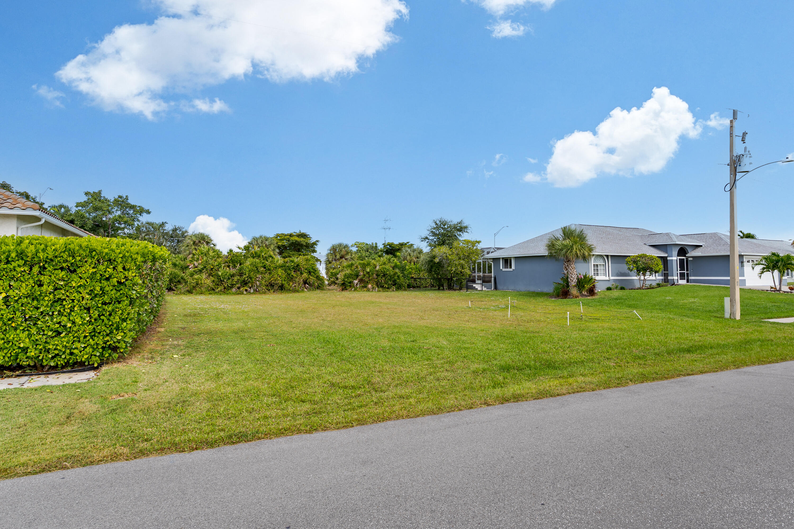 1414 Delbrook Way Marco Island, FL 34145 - Photo 3 of 21 a view of a golf course with a lake