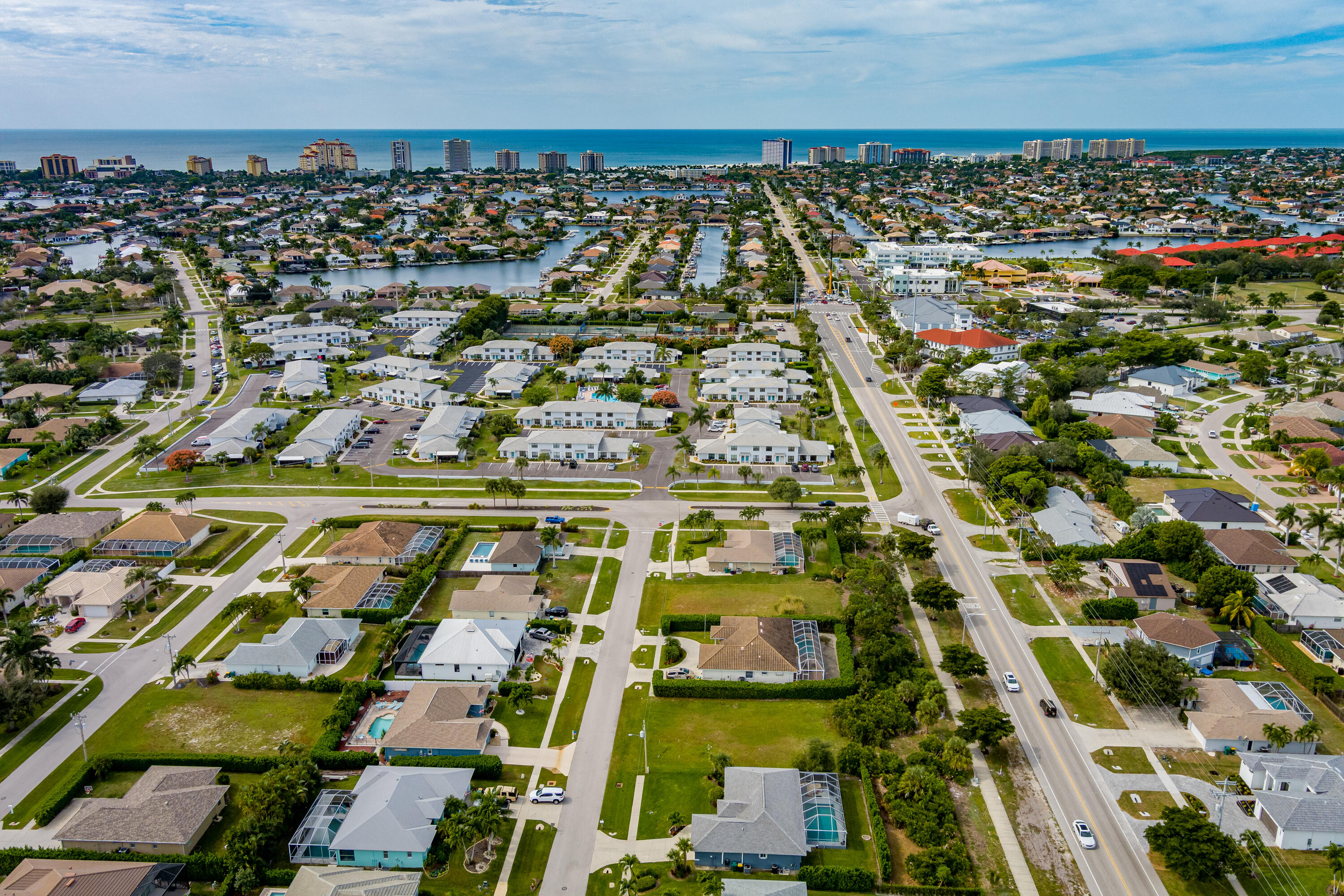 1414 Delbrook Way Marco Island, FL 34145 - Photo 9 of 21 an aerial view of residential building and parking space