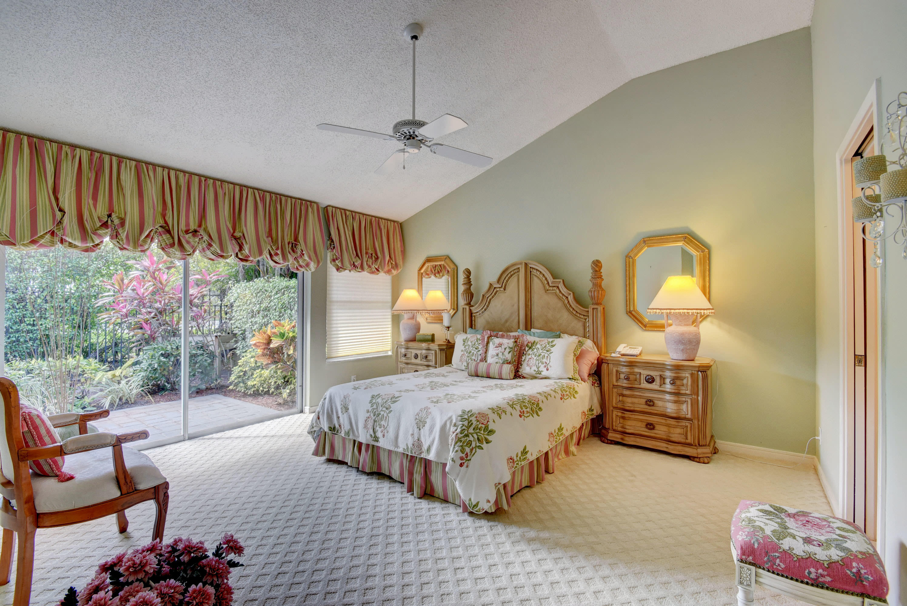 2254 Northwest 52nd Street Boca Raton, FL 33496 - Photo 14 of 28 a bedroom with a bed a flowerpot and window