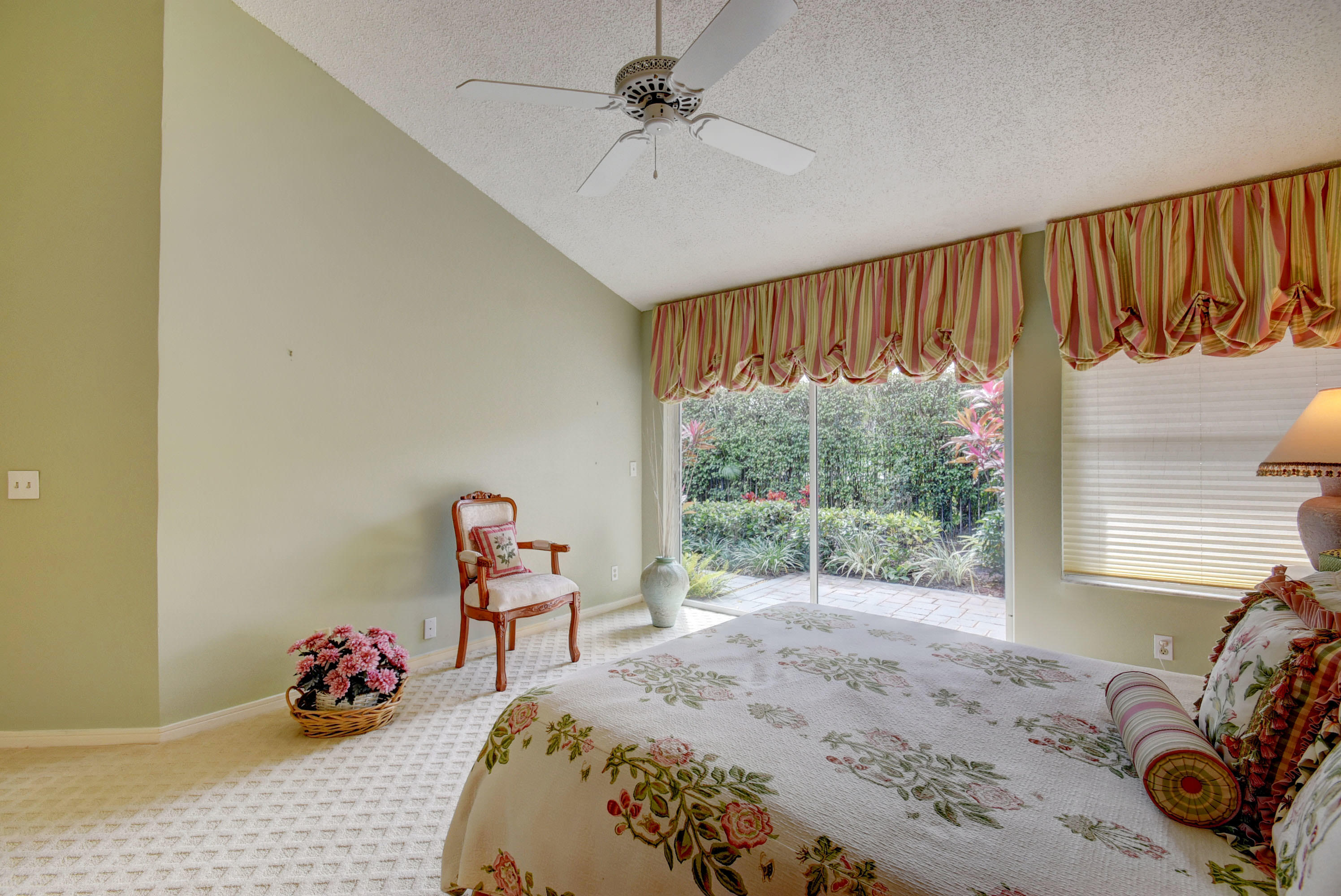 2254 Northwest 52nd Street Boca Raton, FL 33496 - Photo 15 of 28 a bedroom with a bed and a window