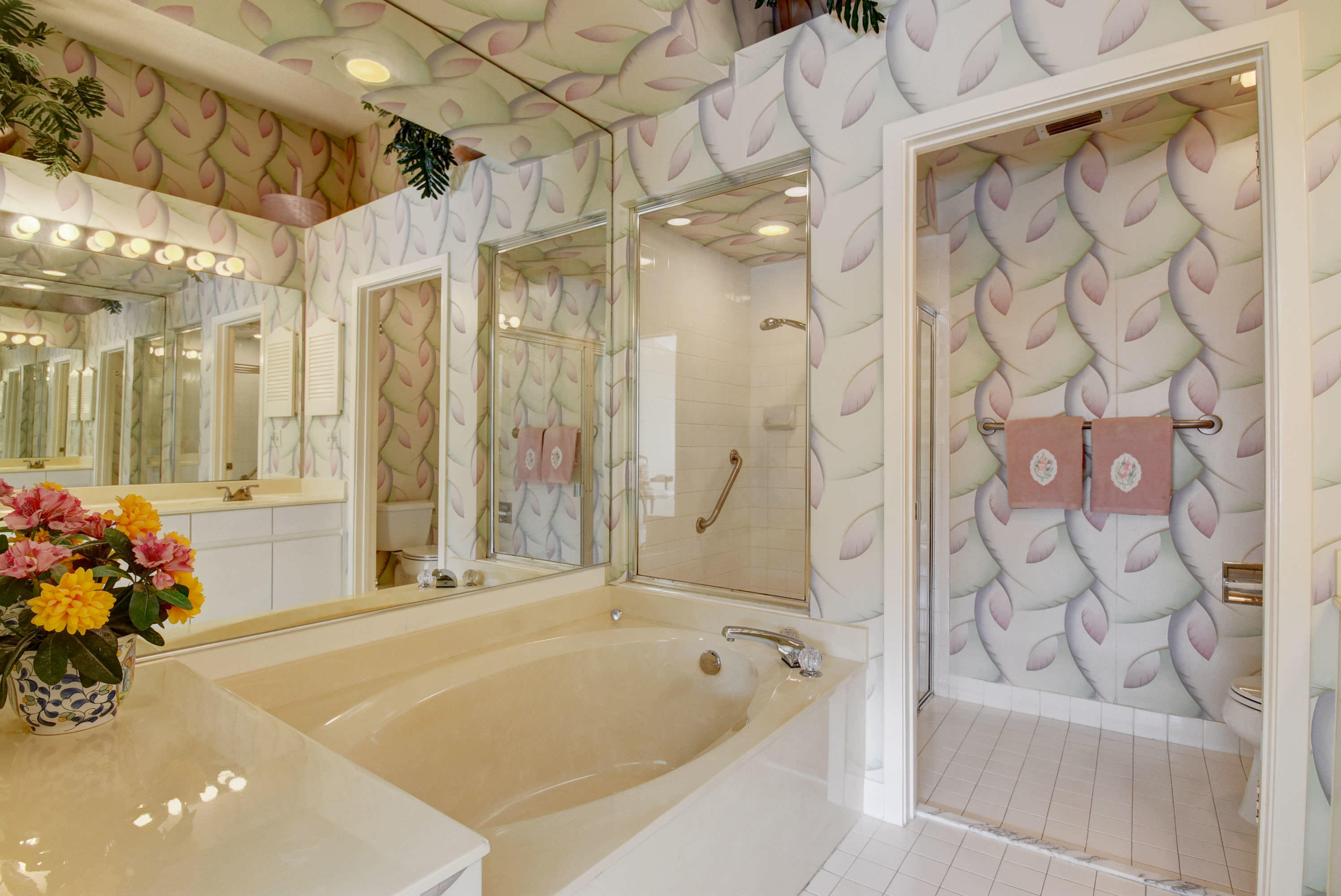 2254 Northwest 52nd Street Boca Raton, FL 33496 - Photo 17 of 28 a bathroom with a bathtub and shower