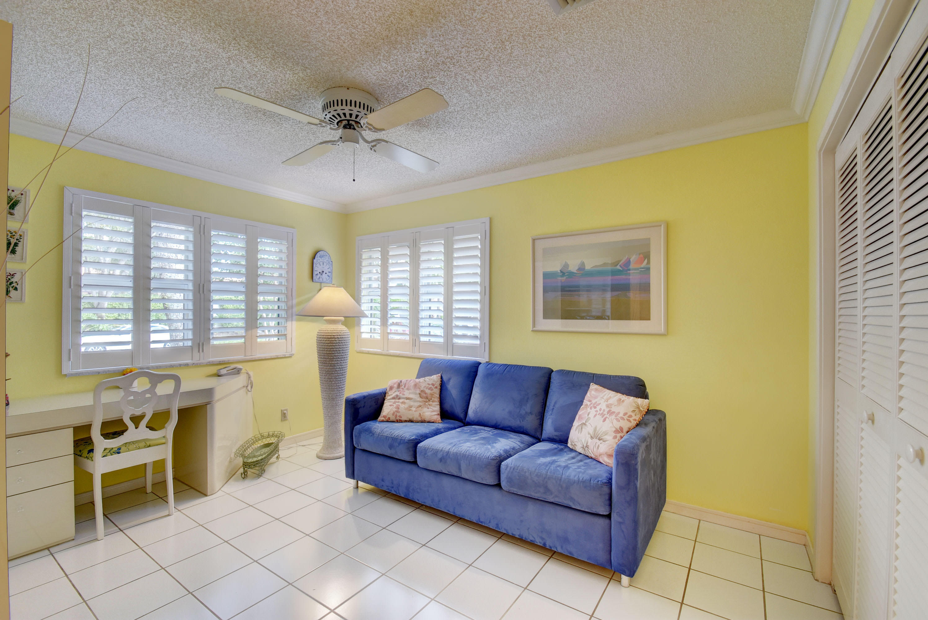 2254 Northwest 52nd Street Boca Raton, FL 33496 - Photo 18 of 28 a living room with furniture and a large window