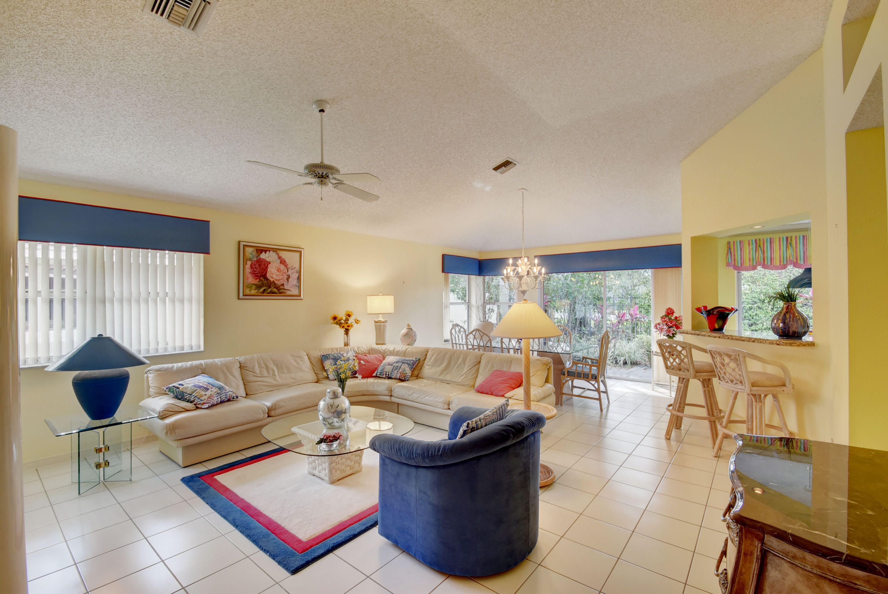 2254 Northwest 52nd Street Boca Raton, FL 33496 - Photo 5 of 28 a living room with furniture and a window