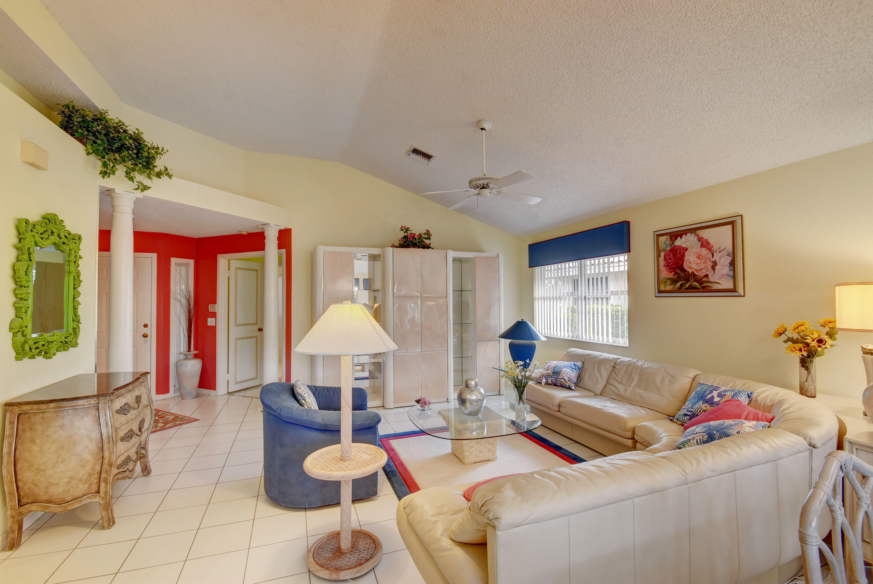 2254 Northwest 52nd Street Boca Raton, FL 33496 - Photo 7 of 28 a living room with furniture and a large window