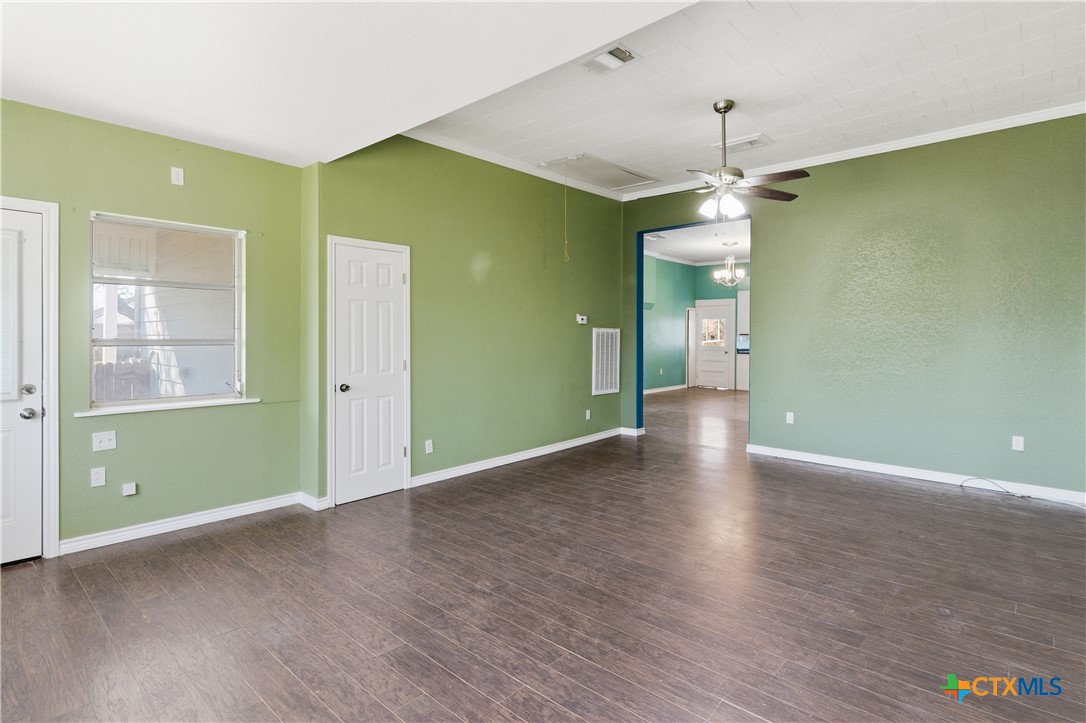 222 East Cedar Street Seguin, TX 78155 - Photo 35 of 46 a view of livingroom with window wooden floor and windows