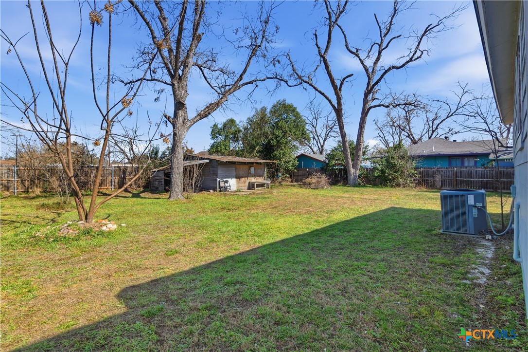 222 East Cedar Street Seguin, TX 78155 - Photo 44 of 46 a view of a house with a yard
