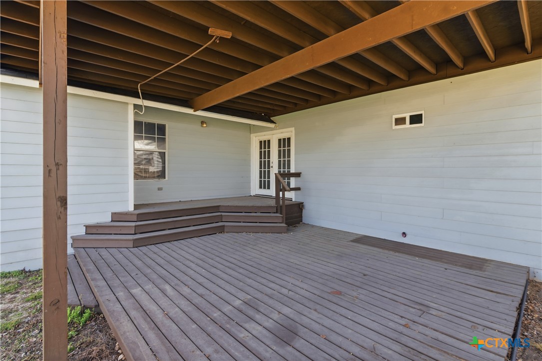 222 East Cedar Street Seguin, TX 78155 - Photo 8 of 46 a view of empty room with wooden floor