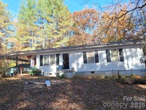 580 Legion Road Lenoir, NC 28645 - Photo 2 of 22 a front view of a house with garden