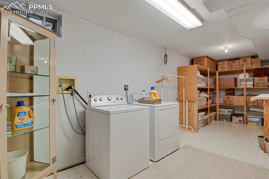 1417 Prairie Road Colorado Springs, CO 80909 - Photo 29 of 34 a utility room with dryer and washer