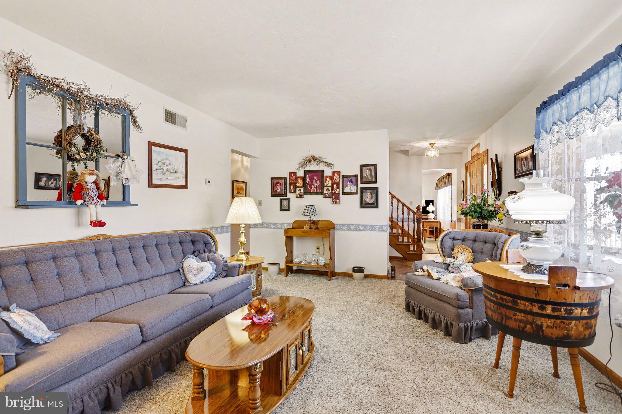 11 Narrow Road Hanover, PA 17331 - Photo 3 of 36 a living room with furniture a couch and a coffee table