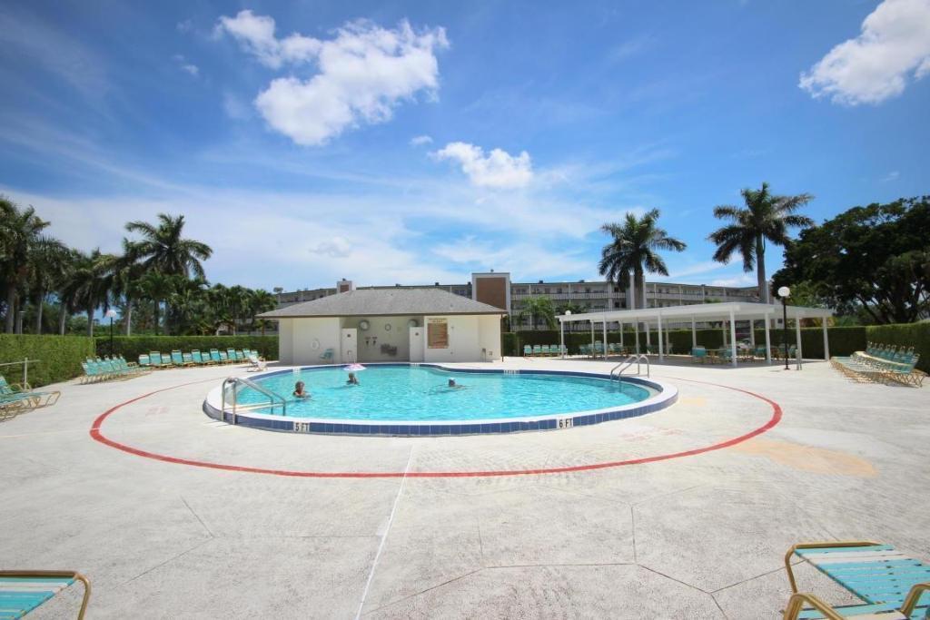 3075 Wolverton East, Unit D Boca Raton, FL 33434 - Photo 17 of 23 CENTURY VILLAGE OUTDOOR POOL