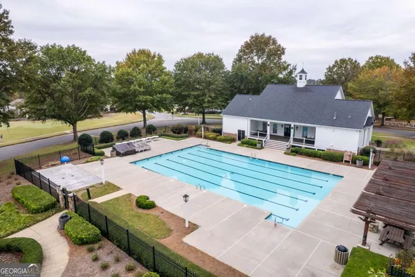 an aerial view of a house with a garden