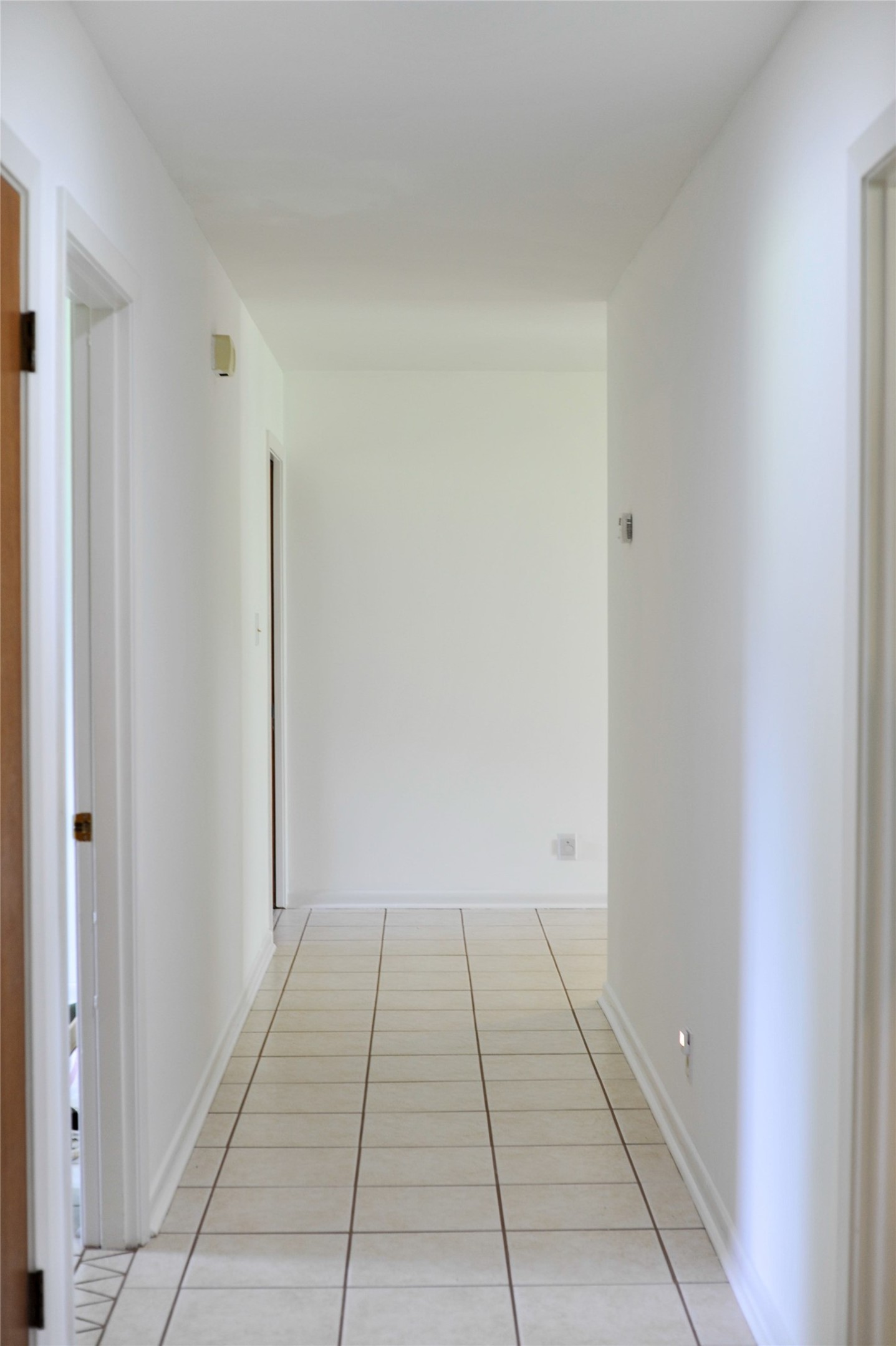402 Peach Point Road Jones Creek, TX 77541 - Photo 20 of 32 Hallway view away from bedrooms/bath