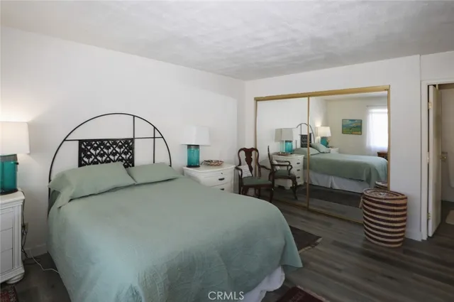 a bathroom with a sink a large mirror and vanity