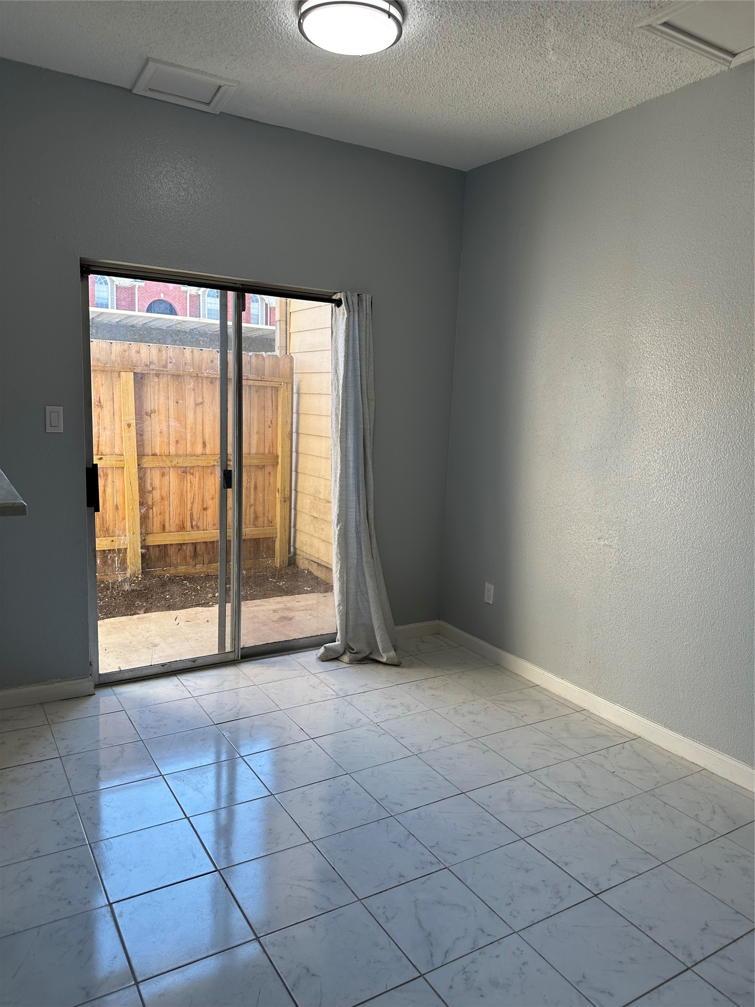 7575 Cambridge Street, Unit 2303 Houston, TX 77054 - Photo 3 of 7 a view of an empty room with a window