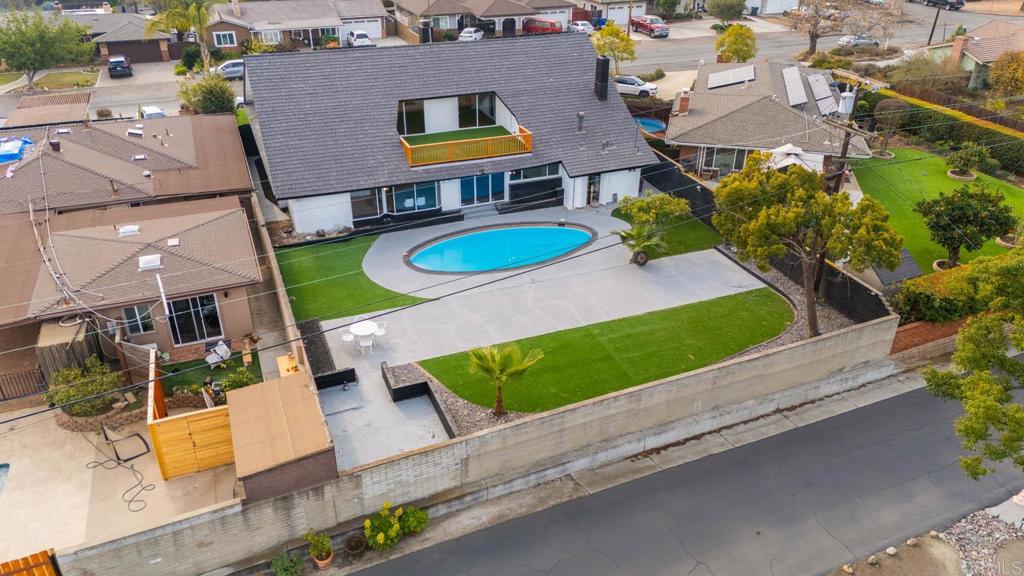 1894 Wedgemere Road El Cajon, CA 92020 - Photo 43 of 60 an aerial view of a house with a garden and street view