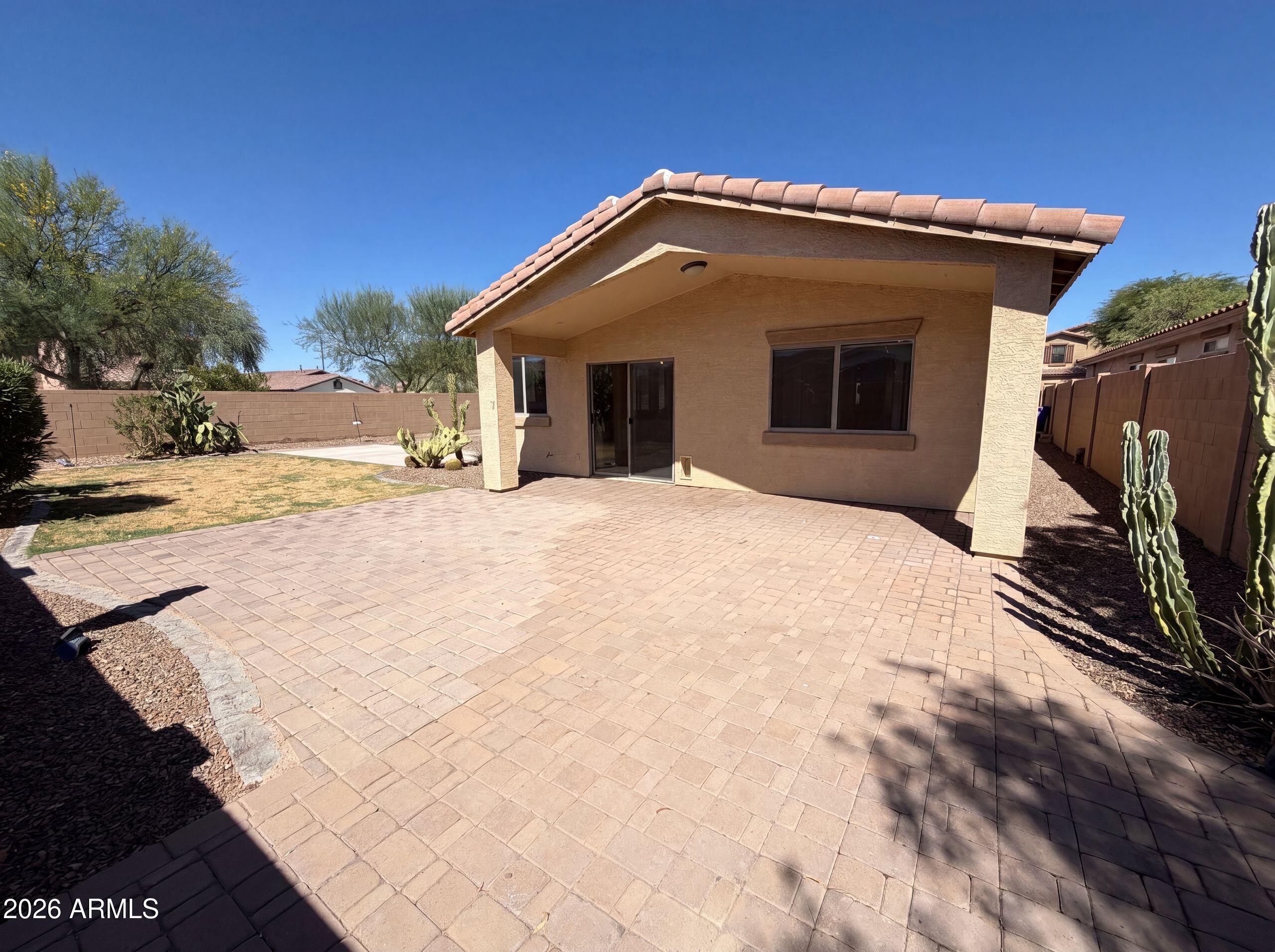 3951 East Timberline Road Gilbert, AZ 85297 - Photo 5 of 28 a view of a house with a patio