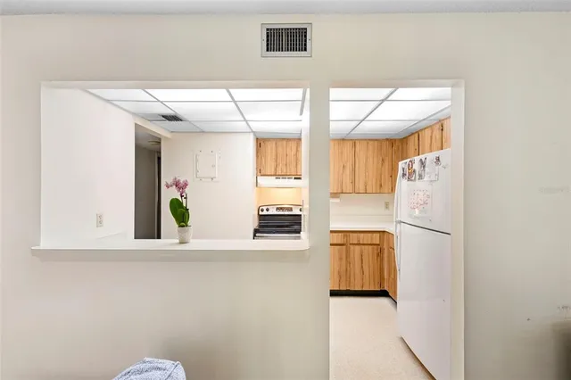a view of a room with wooden floor and closet