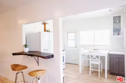 a view of a livingroom with furniture and front door