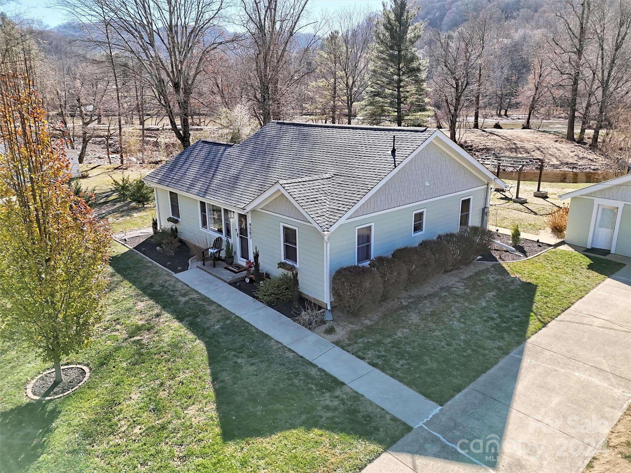 9502 Cruso Road Canton, NC 28716 - Photo 4 of 36 a aerial view of a house with a yard