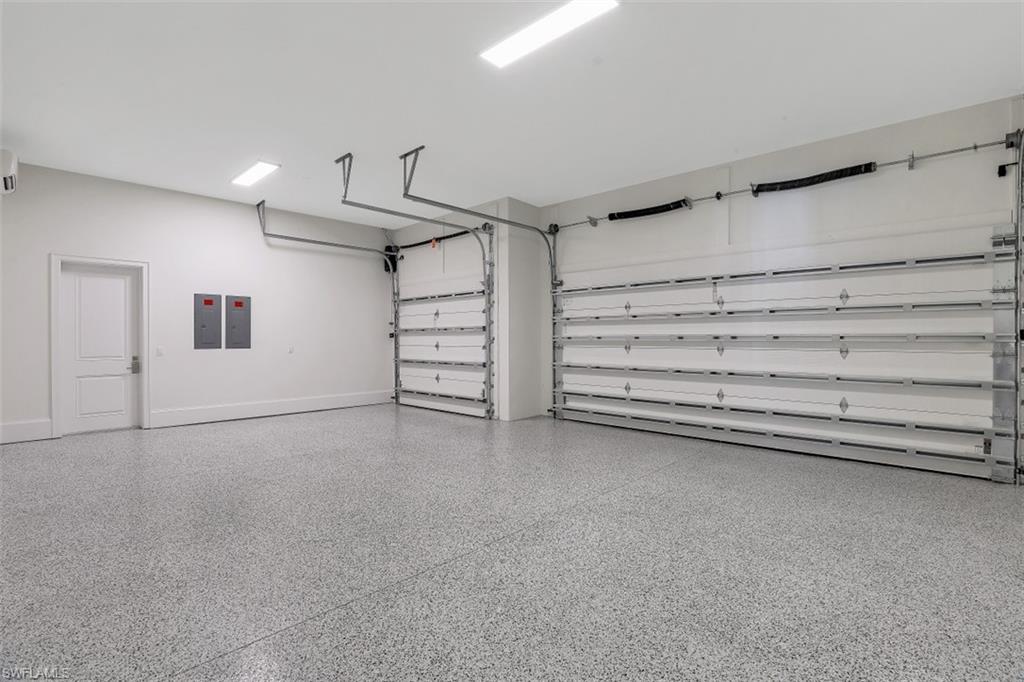 650 Wedge Drive Naples, FL 34103 - Photo 32 of 34 a view of a room with storage and utility room